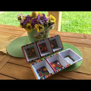 2 plastic colorful trays with 3 compartments each